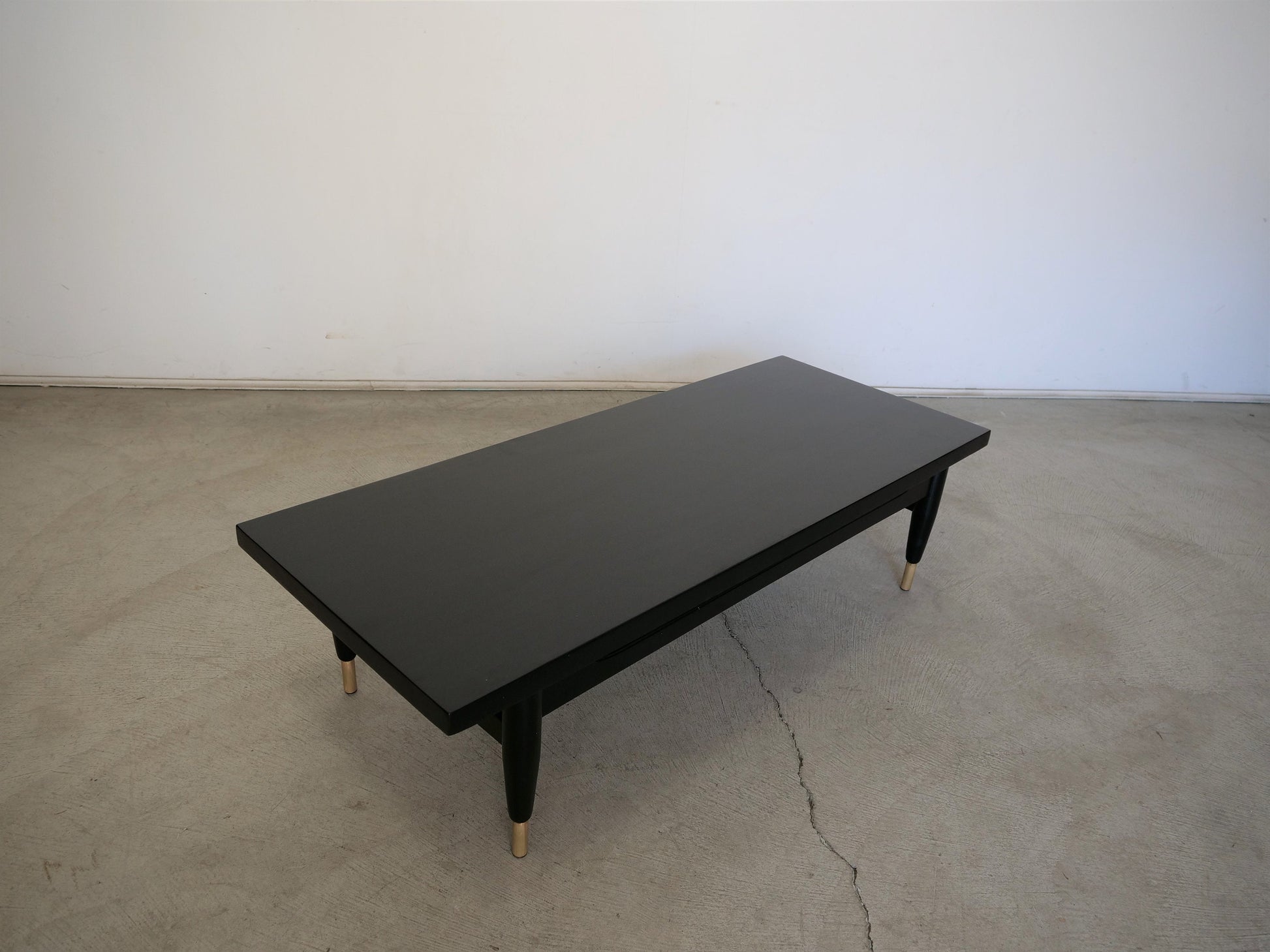 1950's Mid-Century Modern Ebonized Mahogany and Brass Coffee Table