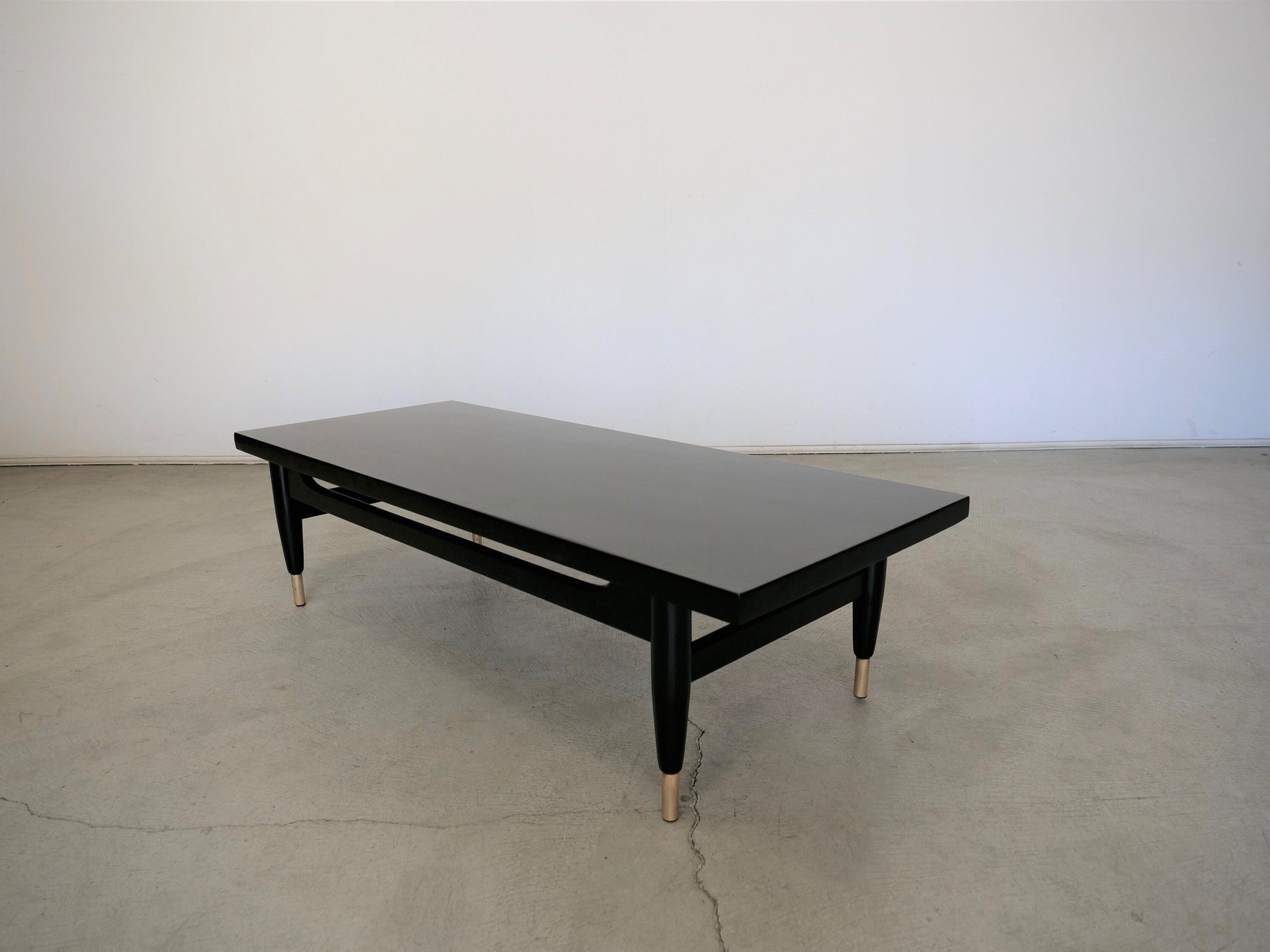 1950's Mid-Century Modern Ebonized Mahogany and Brass Coffee Table